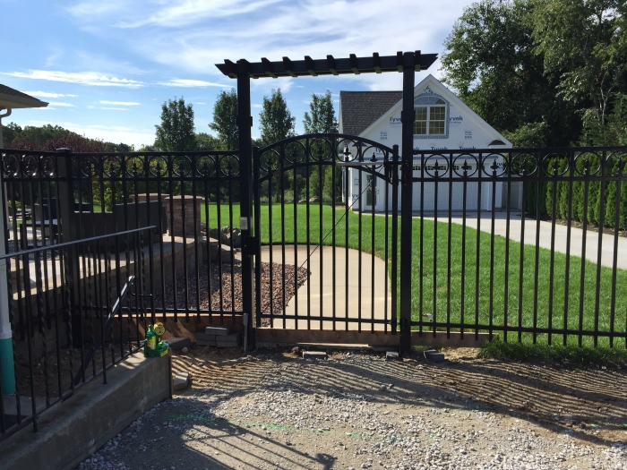 Arched Ornamental Iron Gate with Access Control & Custom Pergola