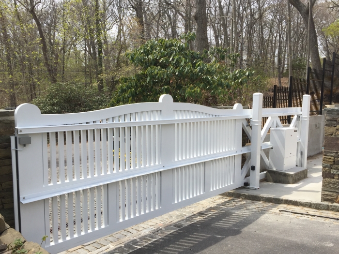 Custom Aluminum Cantilever Gate with a Custom White HySecurity 222 Operator