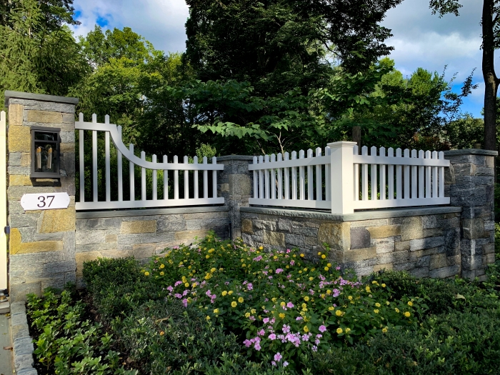 Azek Picket Fence on Stone Wall 