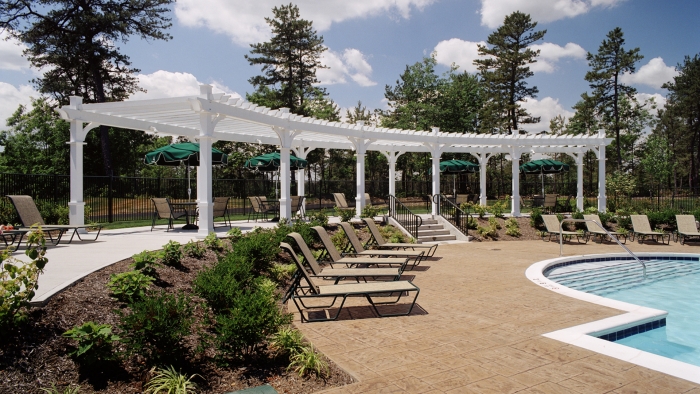 Custom Pergola for Shaded Seating Area Near Pool