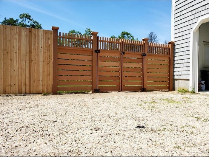 Horizontal Cedar Board Fence with Open Spindle Top